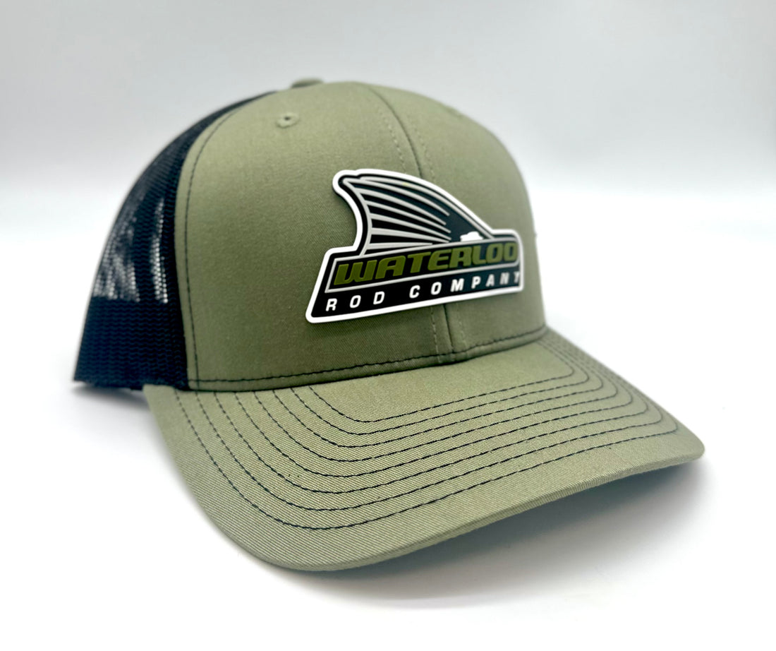 Waterloo Loden and Black Cap - Green Tails Up Logo