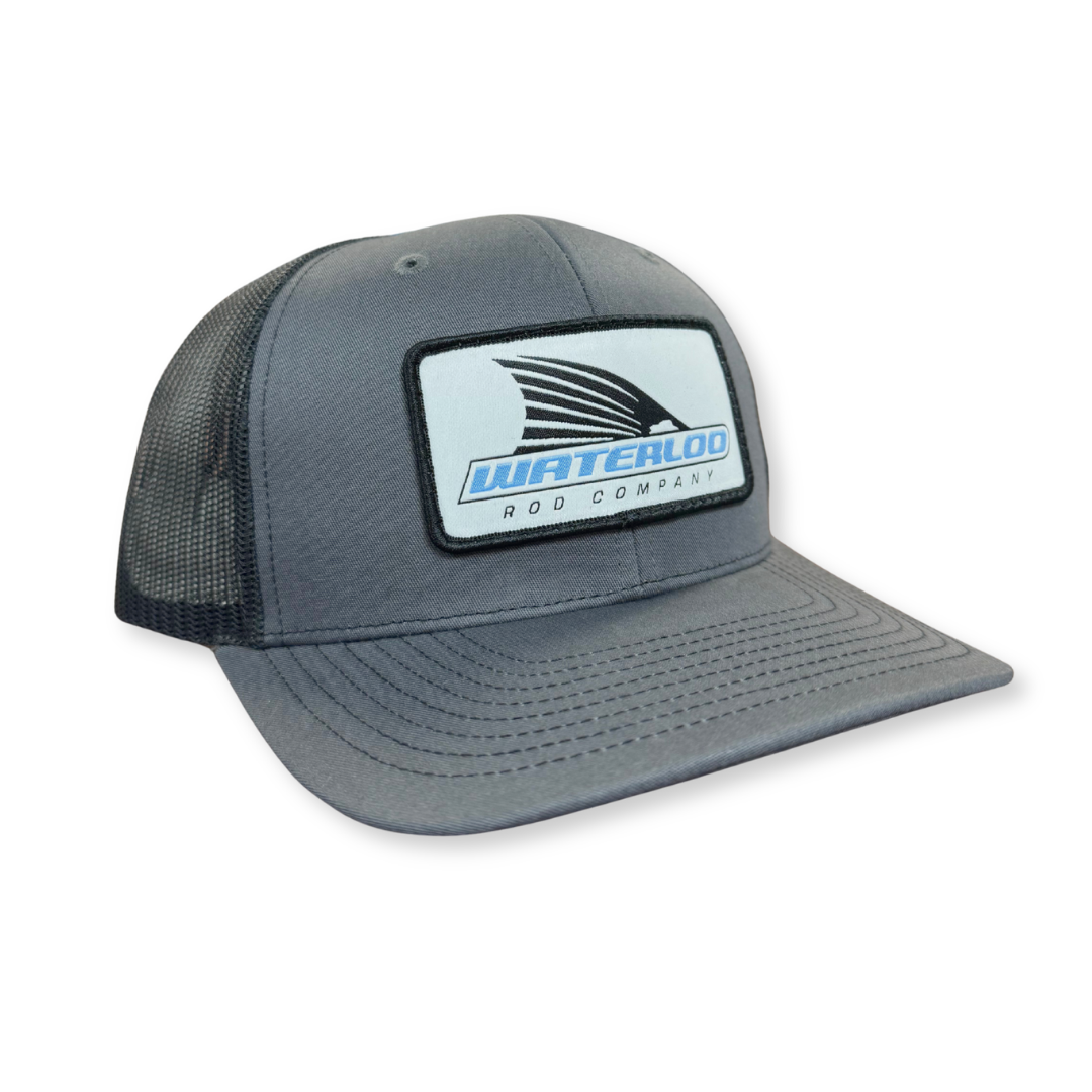 Waterloo Charcoal & Black Cap - Light Blue Tails Up Patch